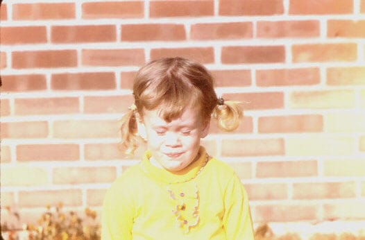 Young girl with eyes closed